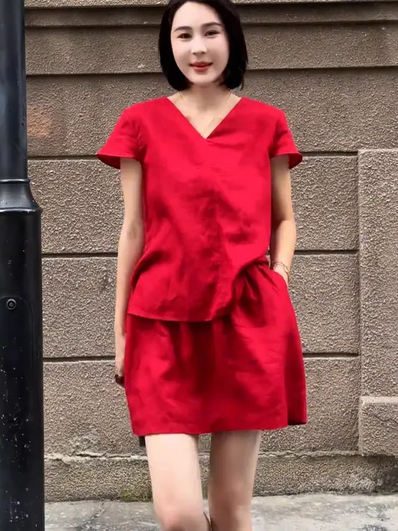 素色松弛感套装女2025新款夏休闲露背蝴蝶结上衣+显瘦短裙两件套