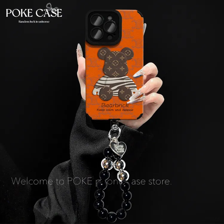 轻奢瞳眼橙色小熊适用苹果17PROMAX华为vivo小米oppo手链手机壳
