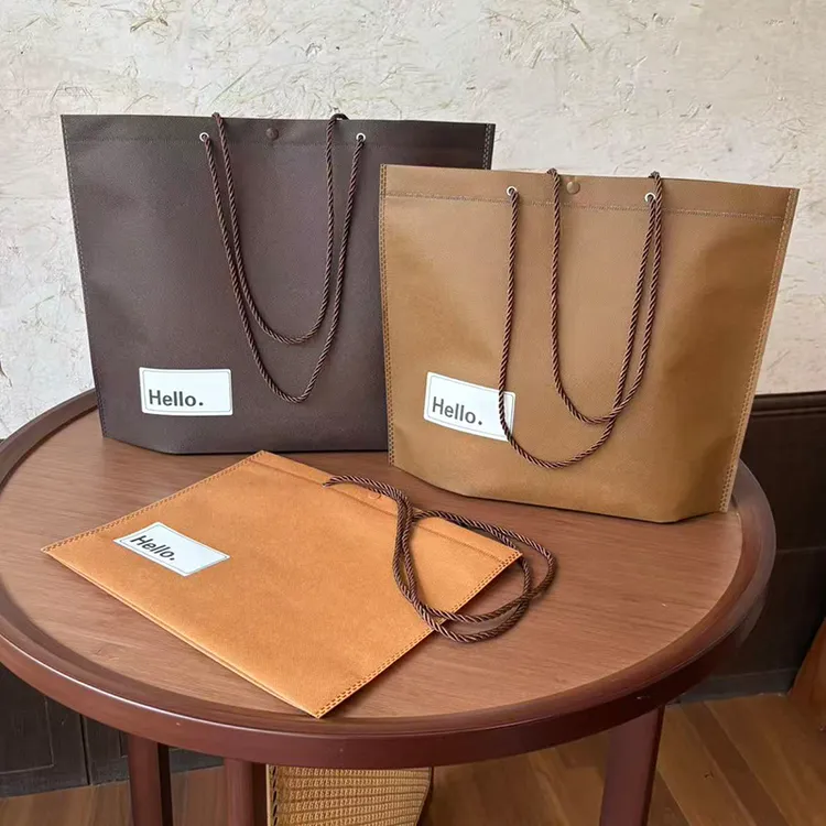 抽绳暗扣环保无纺布手提袋服装店专用袋女装购物袋礼品袋定制logo