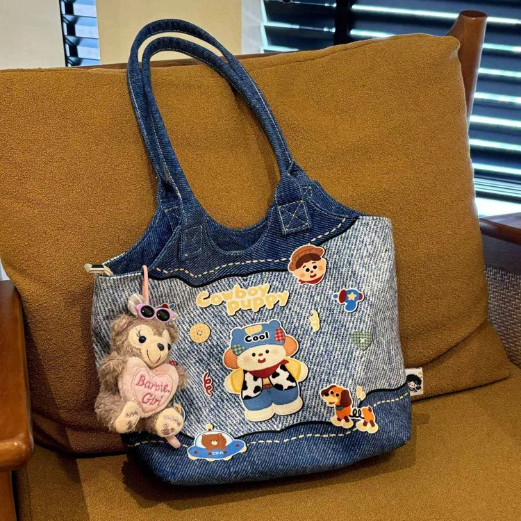 2025原创插画布包可爱百搭大容量手提袋包通勤单肩卡通帆布包包潮