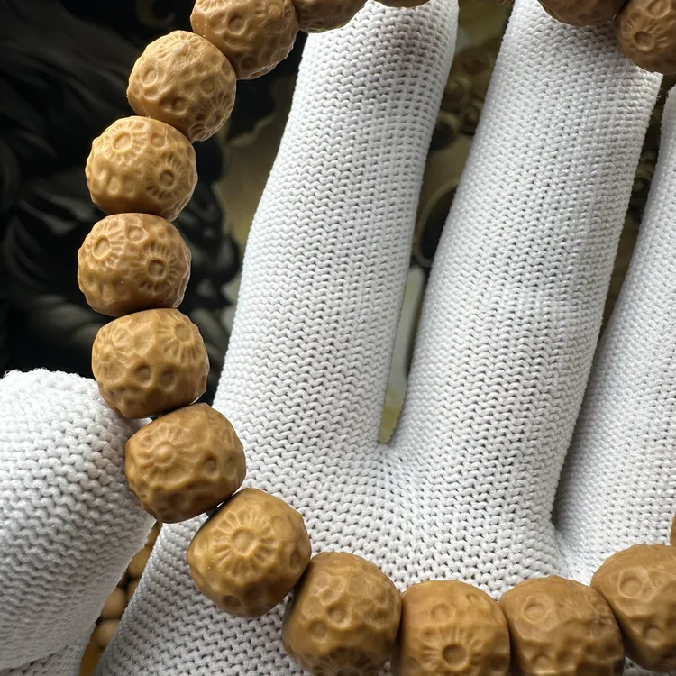 菩提珠串猴头精雕太阳花手串全品无暇