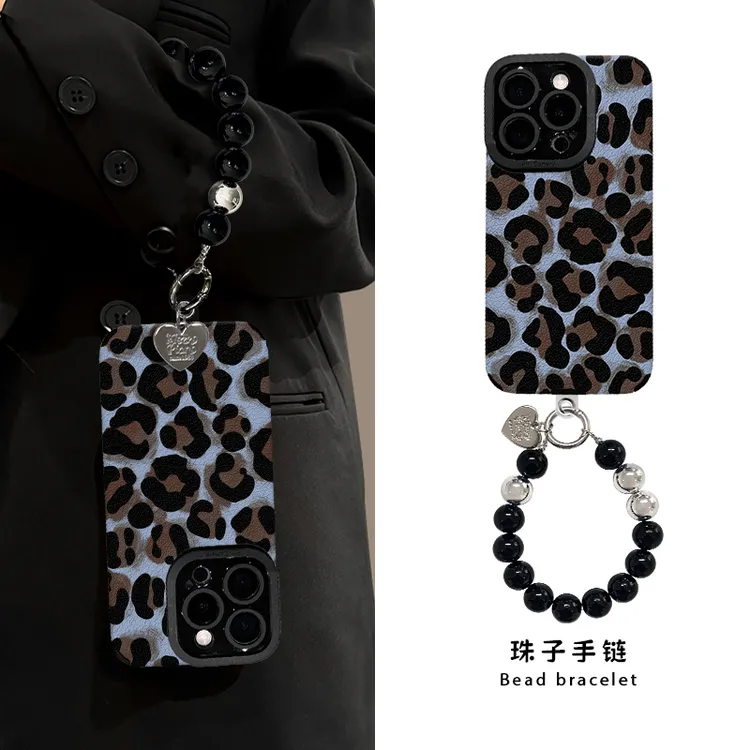 蓝底豹纹适用苹果16华为vivo小米oppo瞳眼羊皮手链手机壳防摔ins