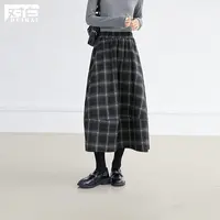 对白经典格纹A字半身裙女2025冬季新款松紧腰气质优雅加厚伞裙子