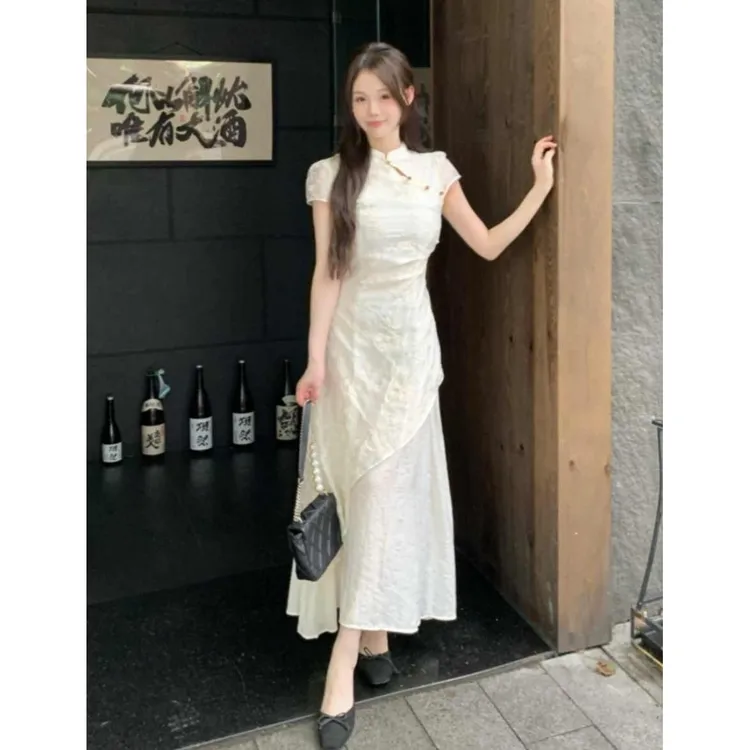新中式改良提花连衣裙女夏季气质国风立领不规则收腰显瘦A字长裙