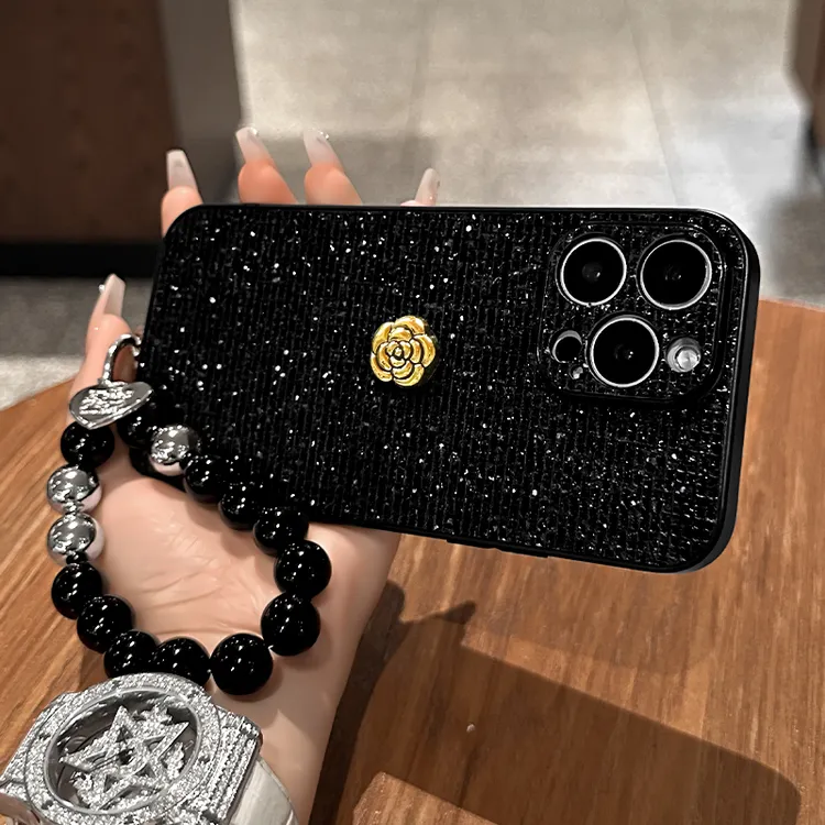 山茶花公仔适用于苹果17华为vivo/oppo小米iPhone闪钻黑色手机壳