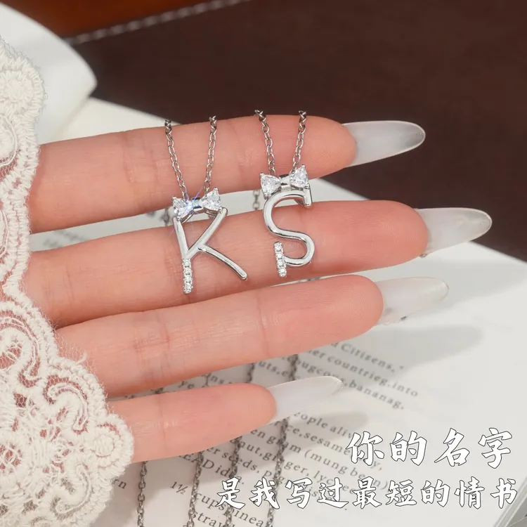 钛钢项链 字母项链原创蝴蝶结字母项链你的名字轻奢百搭锁骨链