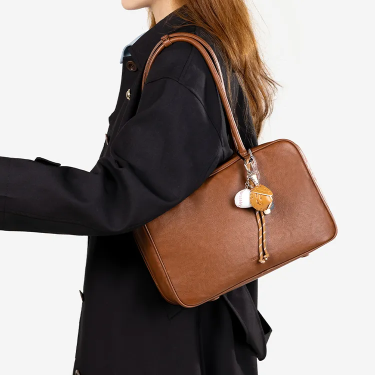 天美意女包2025新款牛皮保龄球包公文包复古手提包大包轻奢斜挎包