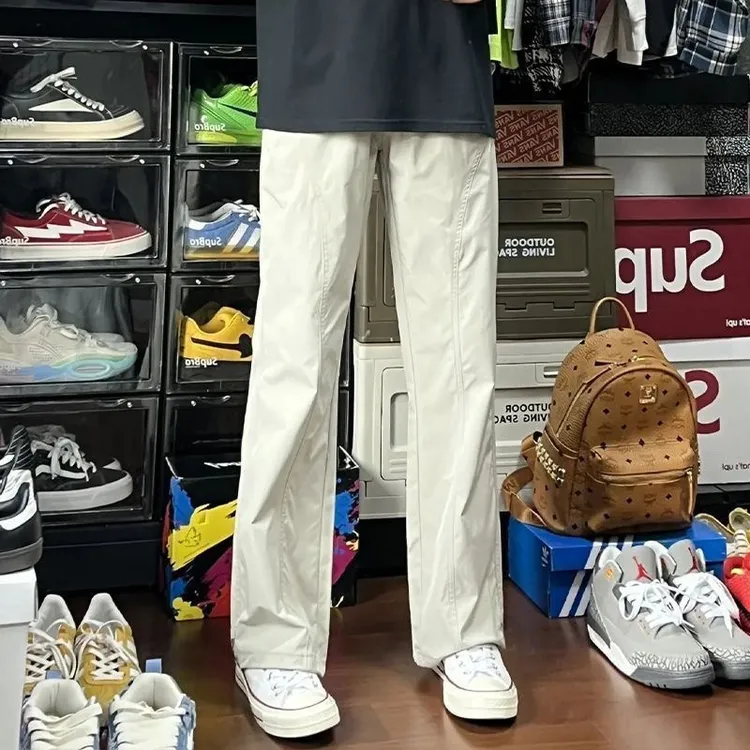 美式户外软壳冲锋裤子男三防春秋徒步运动裤子弯刀微喇斜切休闲裤