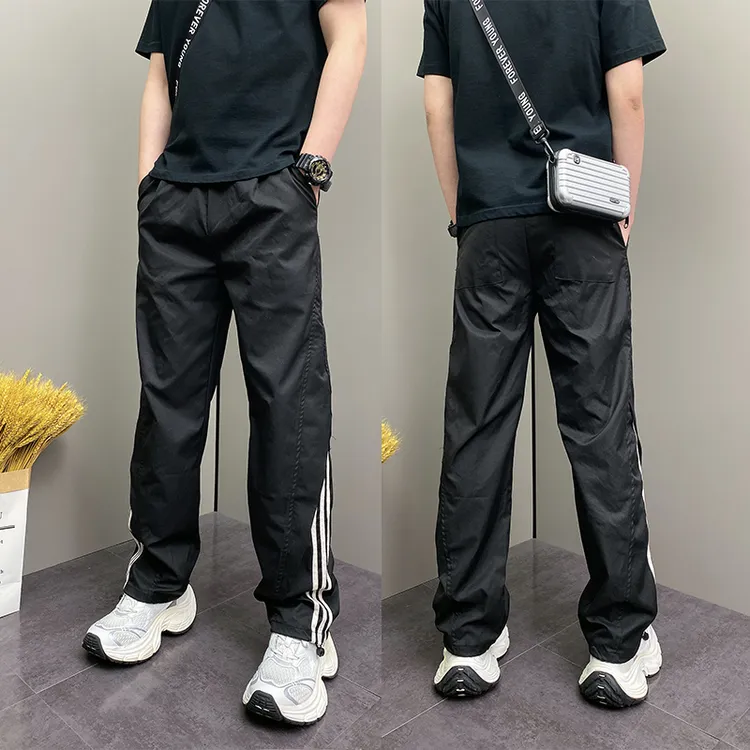 2025年春夏季潮流韩版痞帅宽松哈伦条纹设计高级男士休闲长裤子男