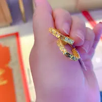 足金镂空三面闪棱形超闪耳扣