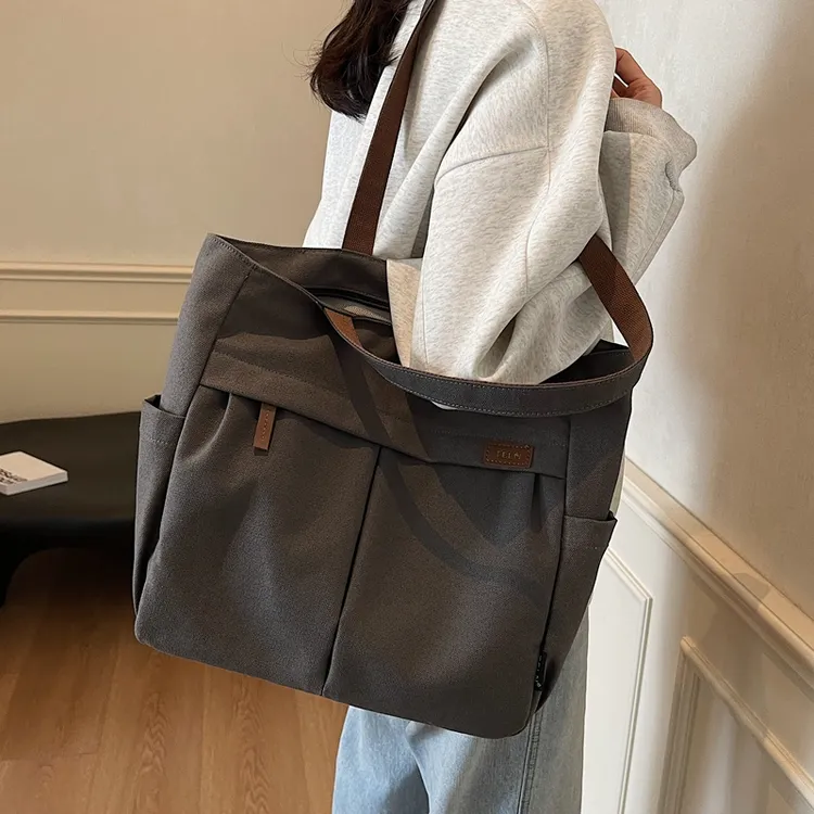 休闲大容量帆布托特包女2025新款简约百搭单肩包大学生上课通勤包