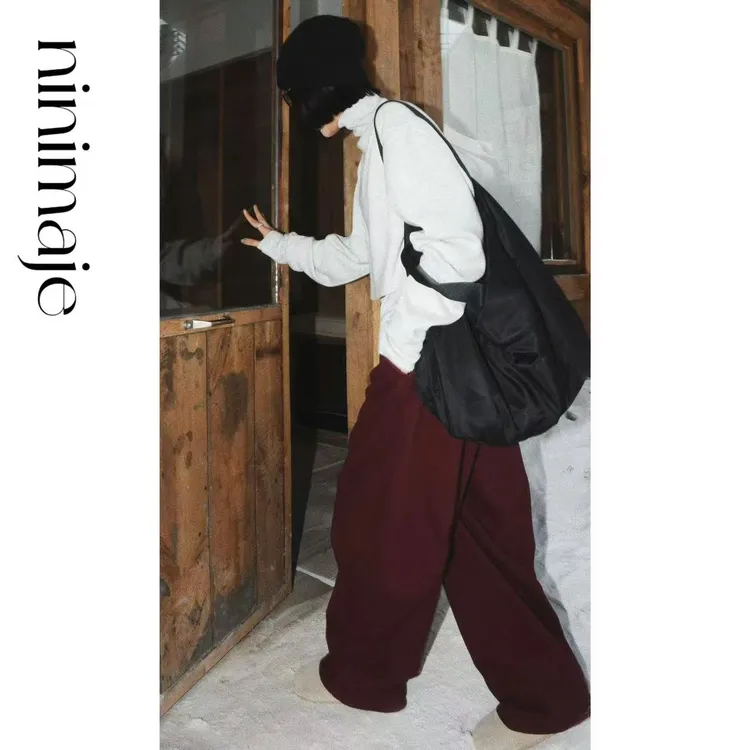  NanBeiBei  极简设计款调性弧形分割剪裁捏褶美式工装裤 6508