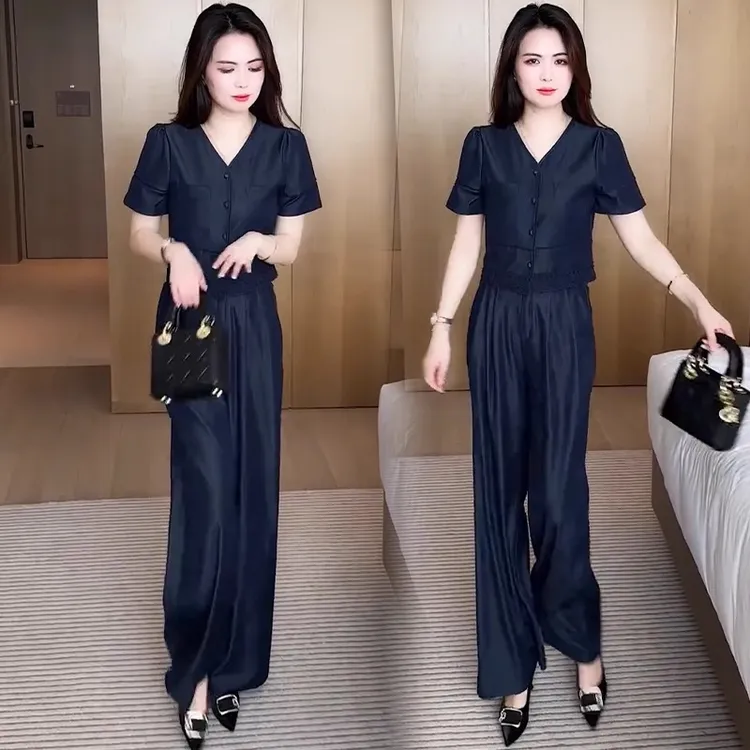 蓝色牛仔套装女2025夏季新款洋气显瘦蕾丝拼接短袖阔腿裤两件套潮