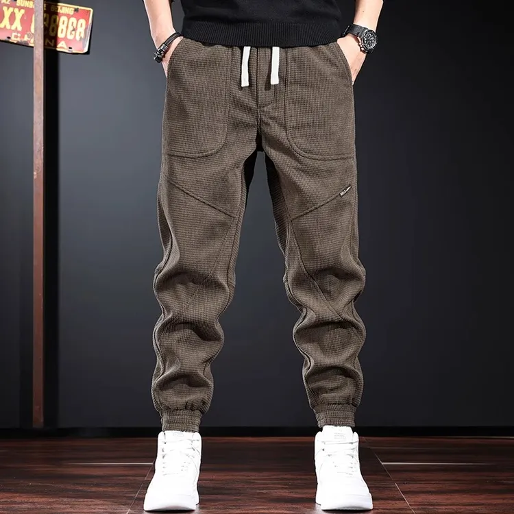 灯芯绒休闲裤男秋冬新款宽松大码潮牌加绒厚款运动裤束脚哈伦裤子