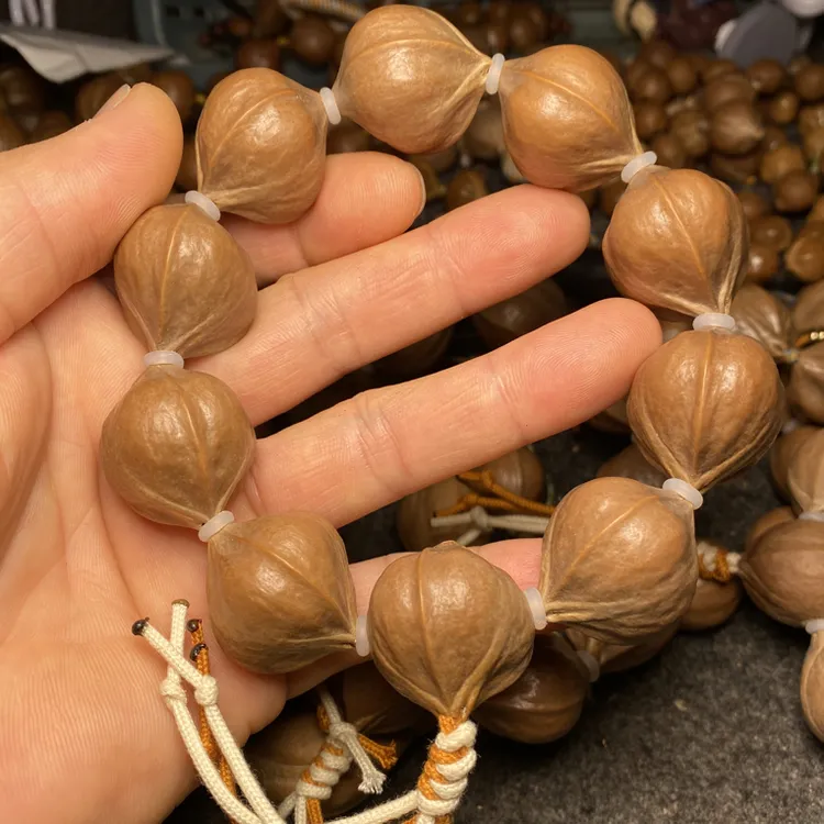 橄榄核铁核原皮短圆手持大尺寸素串