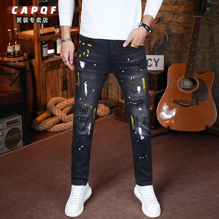 香港高端秋冬新款修身小直筒男士牛仔裤长裤泼墨破洞补丁黑色潮流