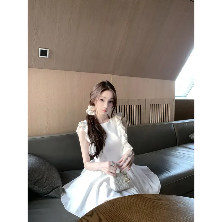 韩系甜美少女2025夏季新款古着小白花露背蝴蝶结绑带连衣裙短裙
