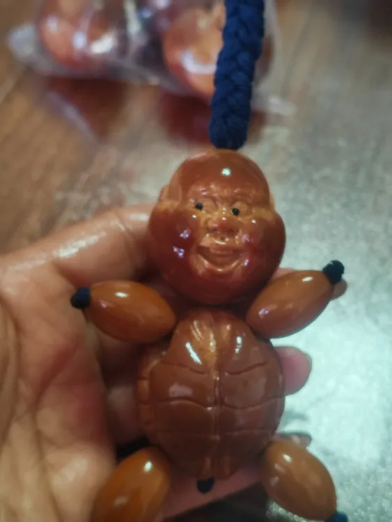 大橄榄核雕龟仙人富贵人生红线红珠文玩手把件