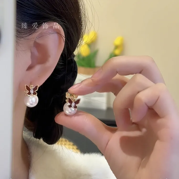铜合金合成锆石耳饰 法式滴釉蝴蝶珠珠小众设计感耳环高级气质