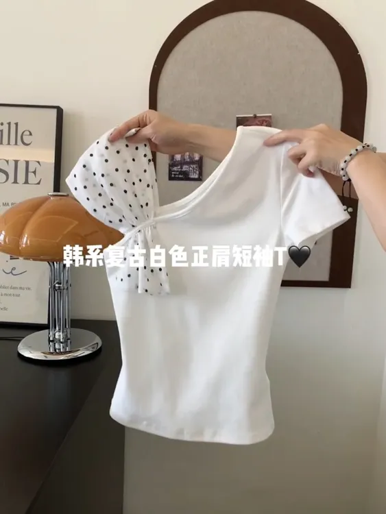法式斜肩波点拼接蝴蝶结针织短袖T恤女夏季气质修身短款露肩上衣