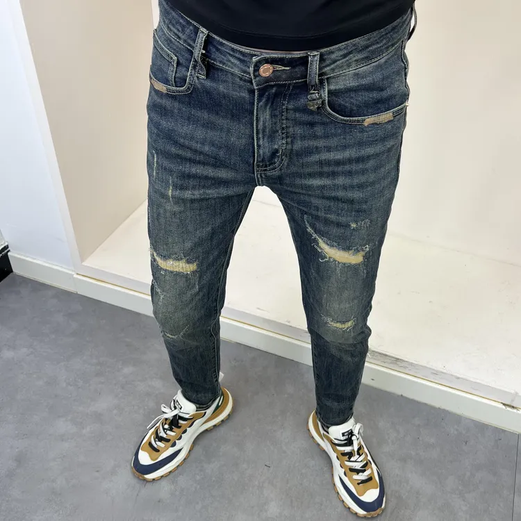 8581秋季新款深蓝色假破洞修身小脚男牛仔裤时尚百搭潮流弹力个性