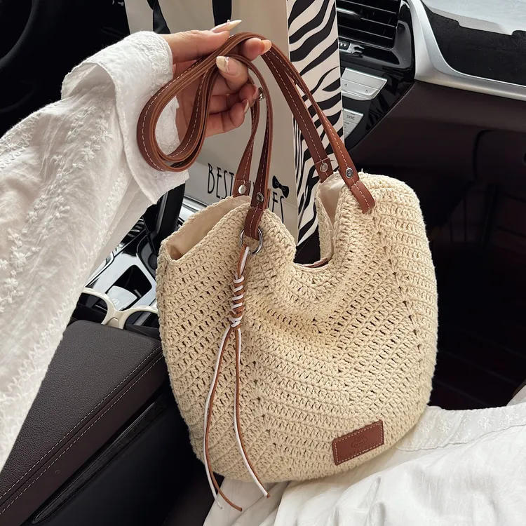 高级感小众菜篮子水桶包女2025新款百搭单肩斜挎度假风通勤托特包