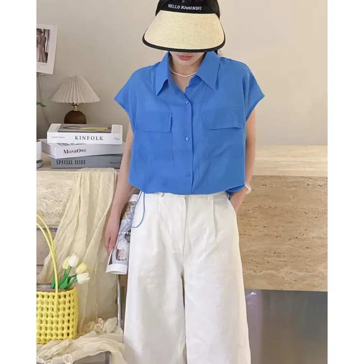 玳妮【工系美衫】夏季翻领单排扣双口袋时尚飞飞袖小衫纯色抽绳上衣