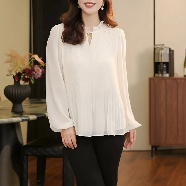 2025秋季新款纽扣圆领下摆木耳花边上衣韩版时尚大码宽松显瘦衬衫