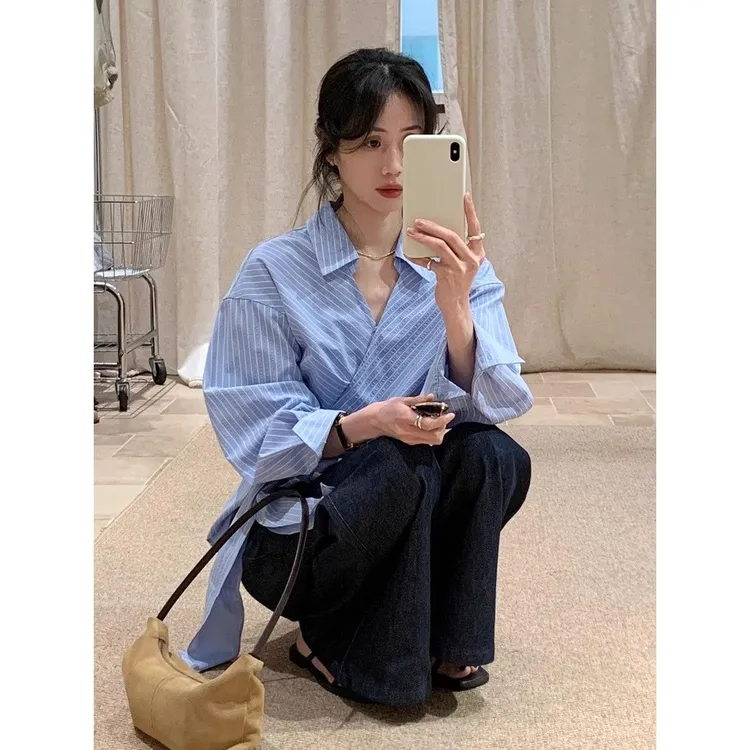 韩系设计感蓝色条纹独特气质显瘦衬衫女2025春夏新款百搭收腰上衣