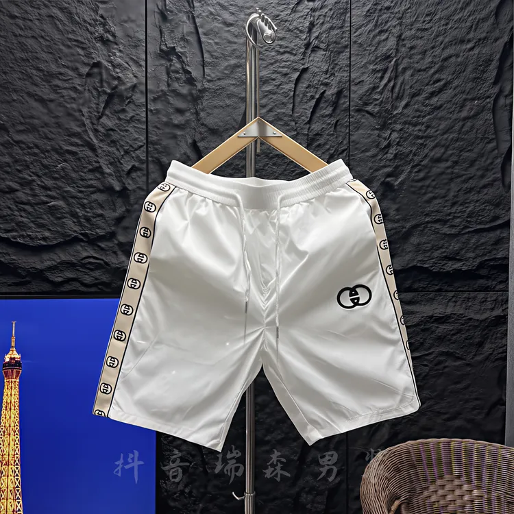 速干运动刺绣薄款夏季青年短裤男士沙滩高智淡人风潮流修身时尚