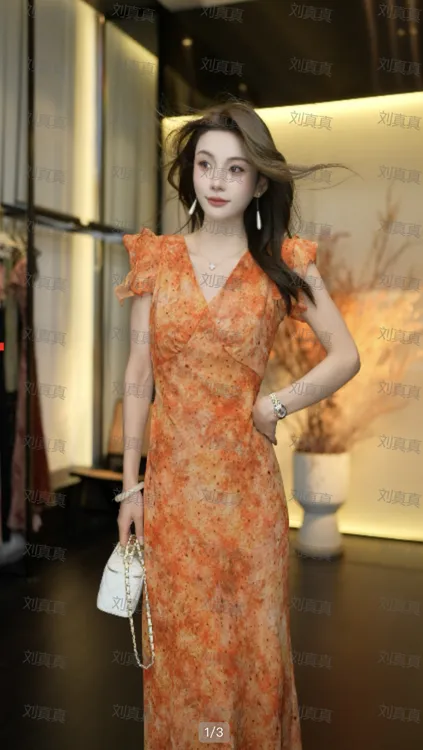 橘色碎花显瘦法式茶歇连衣裙夏季显气质度假风裙子