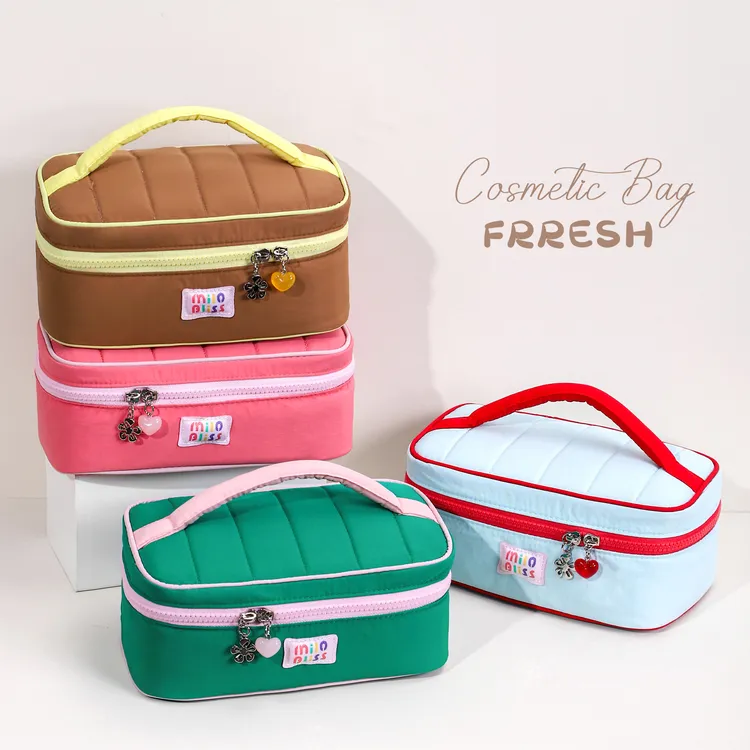 化妆包女便携式化妆品化妆刷大容量收纳袋杂物包可爱2025新款高端