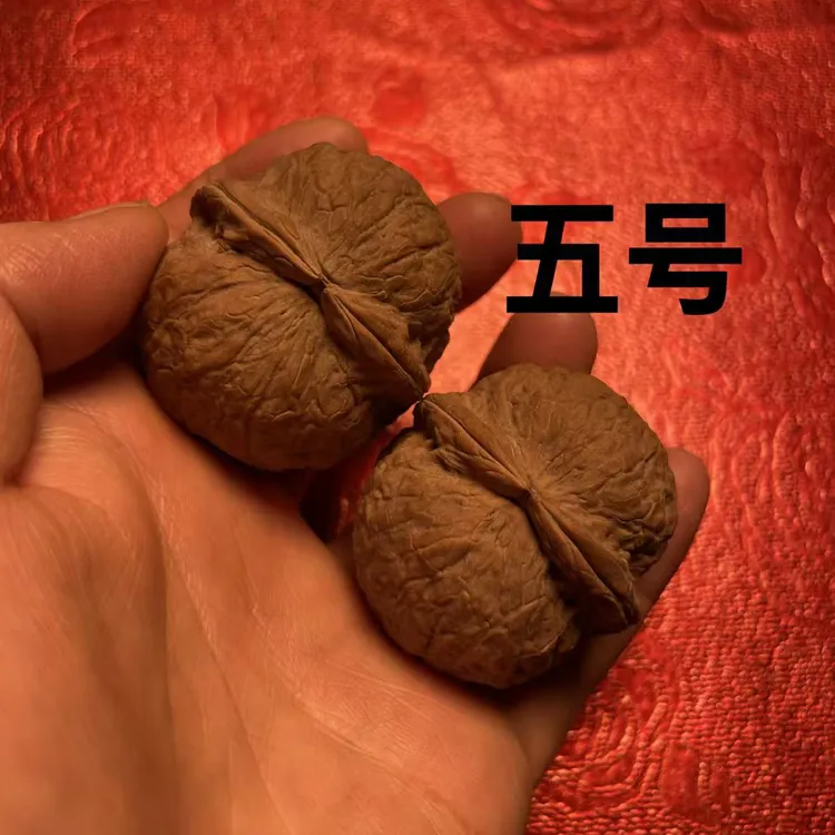 文玩核桃纯野生铁核桃两棱元宝