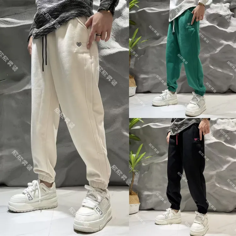 潮牌刺绣拼接弯刀宽松束脚时尚男士卫裤