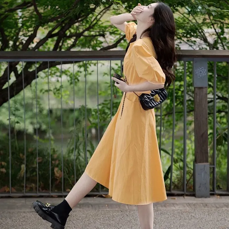 2025小众女装收腰减龄显瘦长裙法式连衣裙黄色夏季泡泡袖新款裙子