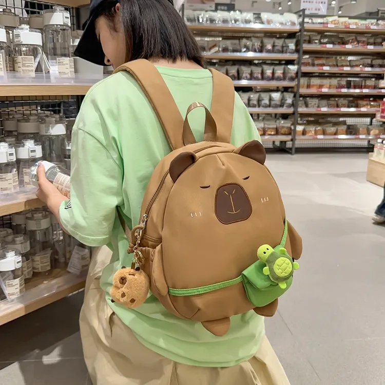 儿童可爱卡皮巴拉双肩包包女2025日系丑萌搞怪小书包网红卡通背包