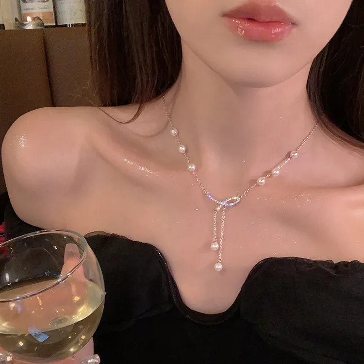 合金项链 蝴蝶结珍珠流苏项链女轻奢小众颈链设计感高级感锁骨链