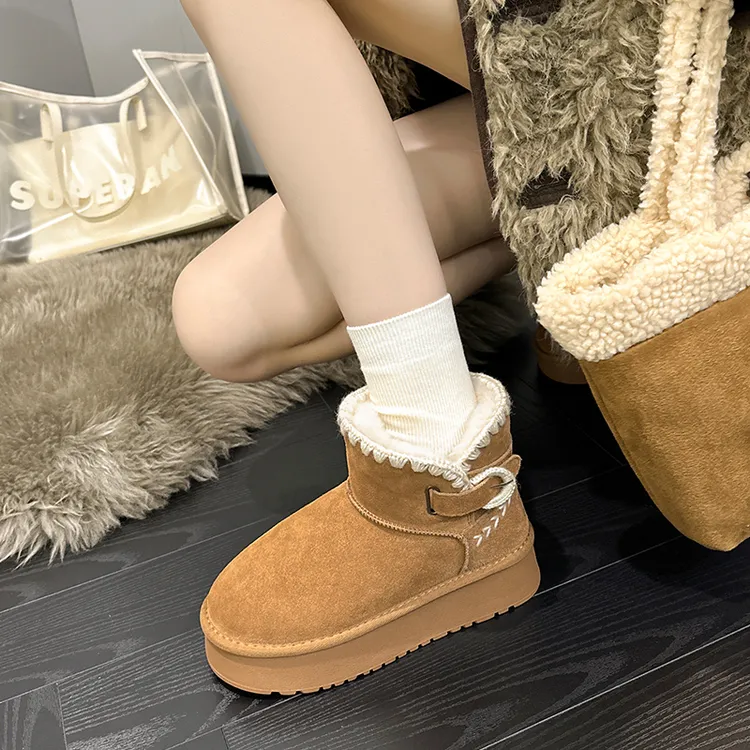 真皮内增高9CM羊皮毛一体勾花防滑雪地靴女短筒羊毛保暖增高棉鞋