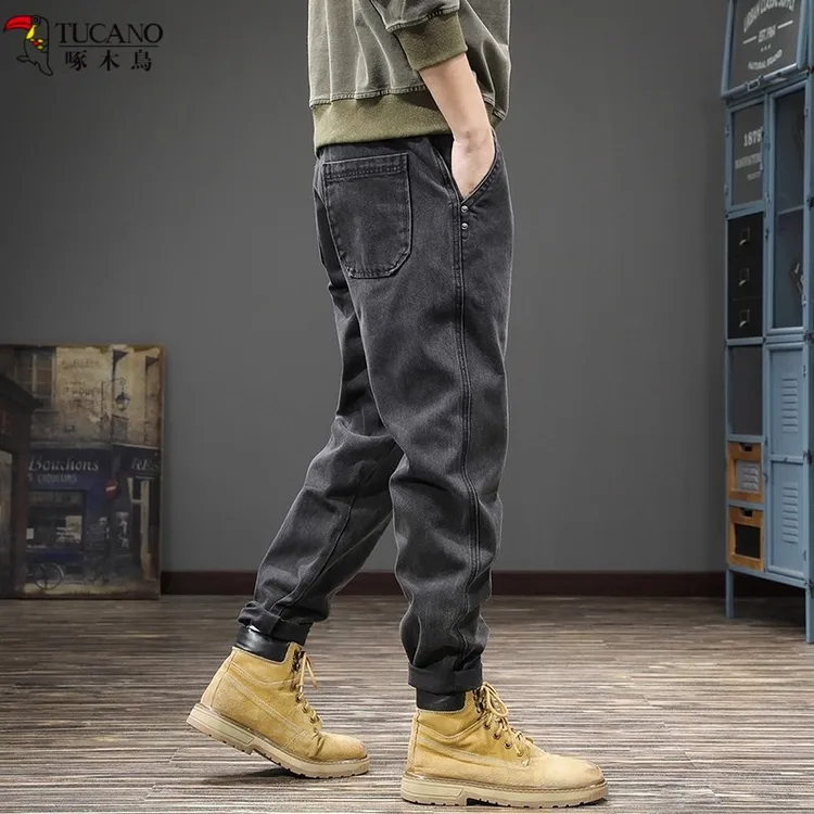 啄木鸟秋季潮牌2025新款牛仔裤宽松百搭休闲裤春秋高端哈伦小脚裤