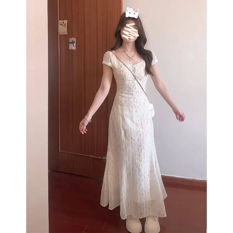 设计感连衣裙女2025夏季新款法式气质花边短袖收腰中长款碎花裙子