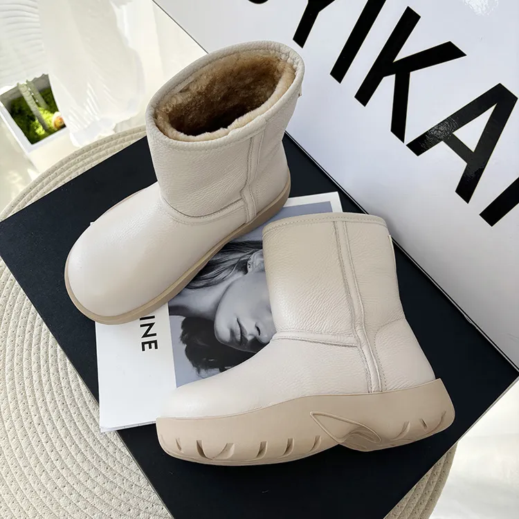 零下30°保暖羊皮毛一体雪地靴女白色真皮厚底防水防滑东北短靴子