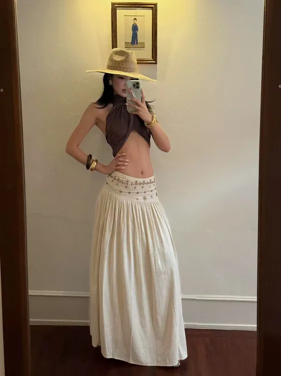 性感辣妹气质挂脖背心上衣女夏季2025新款设计感显瘦半身裙套装潮