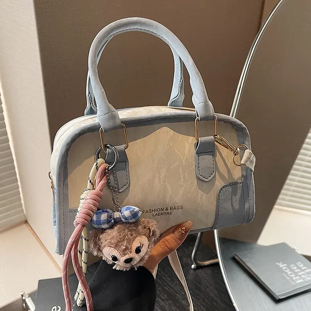 高级感手提包枕头包女新款时尚复古通勤单肩包斜挎包保龄包腋下包