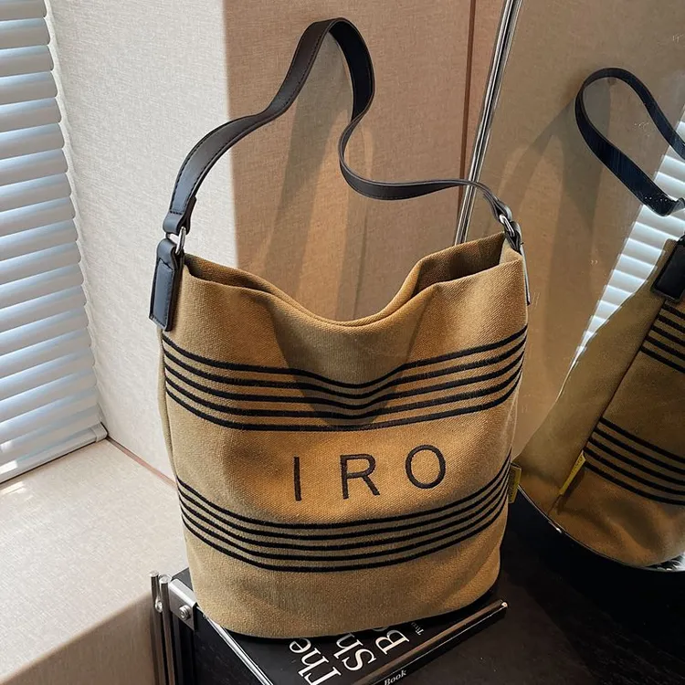 大容量休闲帆布包包女2025秋季新款洋气时尚水桶慵懒风单肩斜挎包