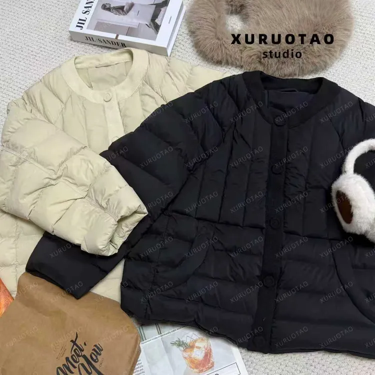 XURUOTAO【轻气球羽绒】秋冬季针织领边拼接保暖两色羽绒服 T5865