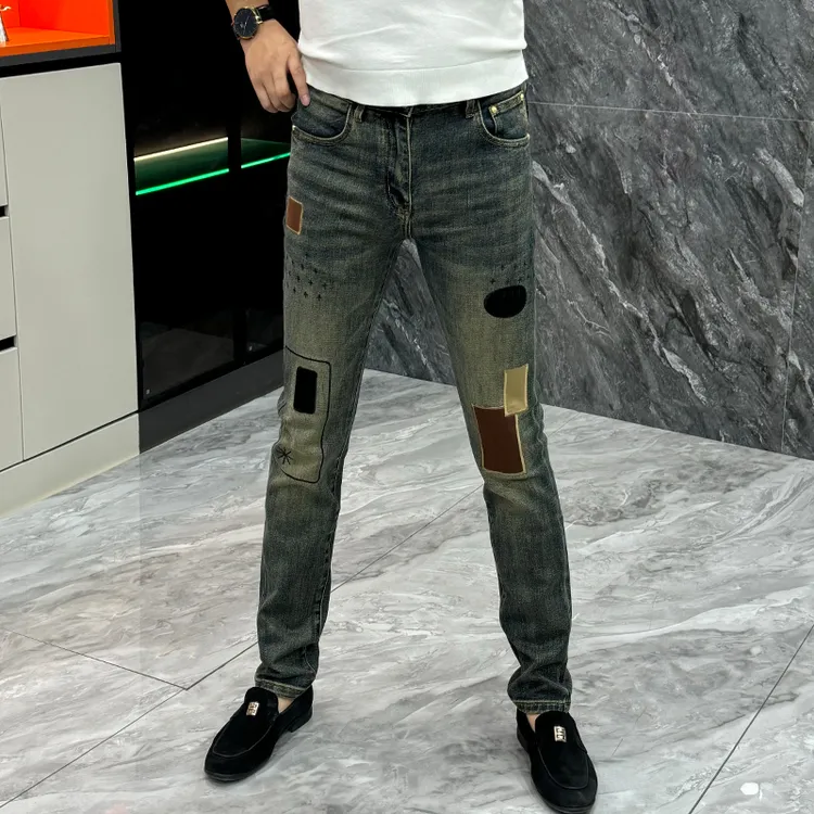 高级感印花补丁牛仔裤男春秋款修身显瘦小脚裤青年帅气百搭直筒裤