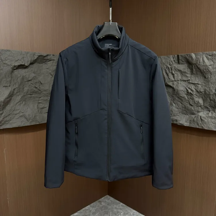 7557冬季新款羽绒服爆款户外立领软壳保暖纯色净版冲锋衣