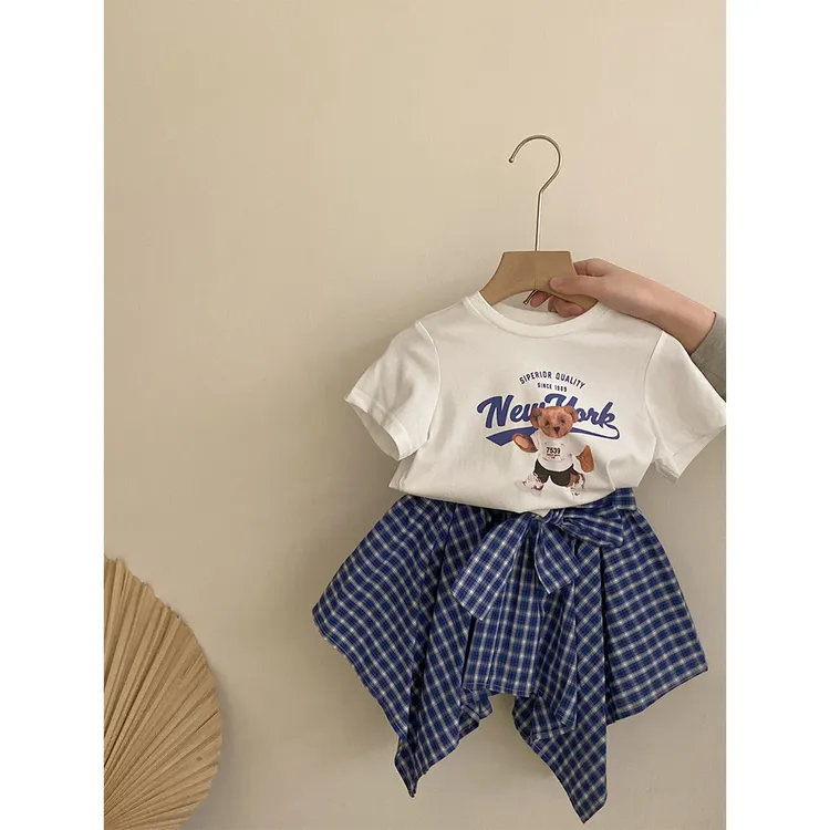 女童韩版2025夏季新款小熊印花短袖上衣格子蝴蝶结百搭不规则短裙