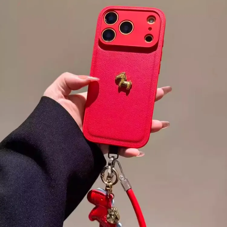 适用苹果17promax手机壳iPhone16/13防摔15红色皮纹立体金属马