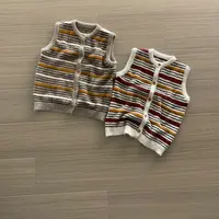 【刘噗噗】撞色木扣马甲 复古经典撞色条纹马甲